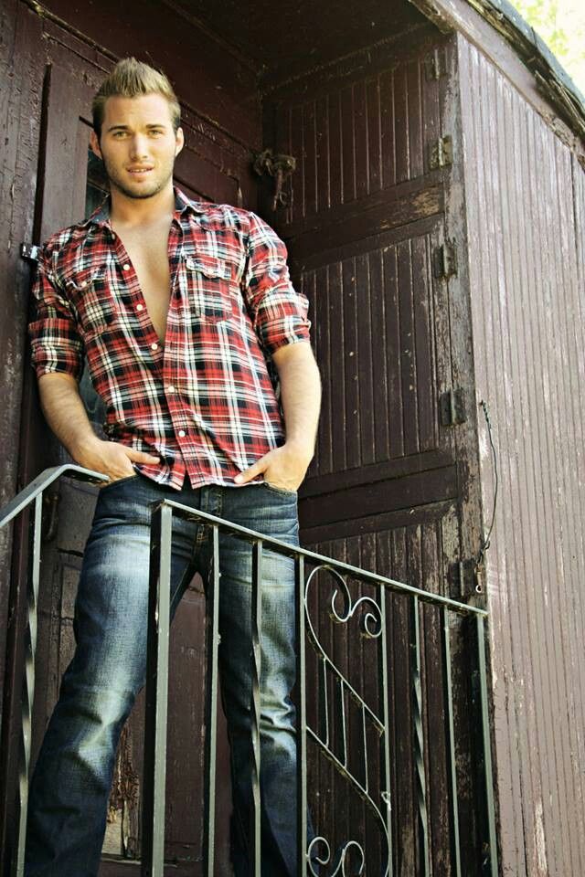 Youn man in red plaid shirt